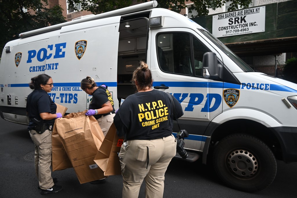 NYPD crime scene unit officers collecting evidence.