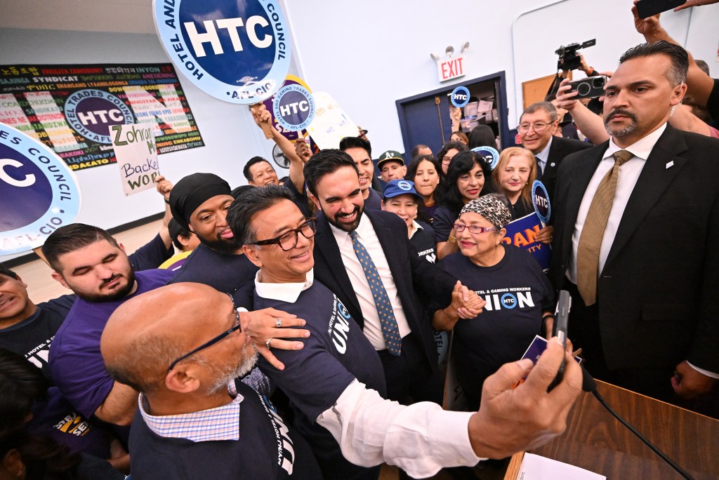 Zohran Mamdani at a labor rally with union leaders.