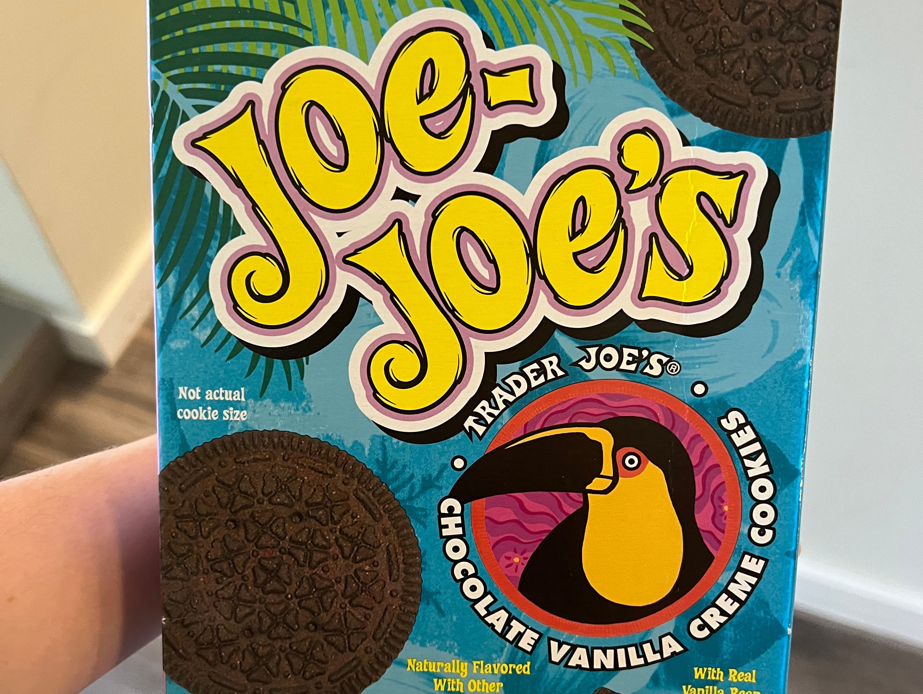 The writer holds a box of Joe-Joe's cookies with a toucan on the the packaging