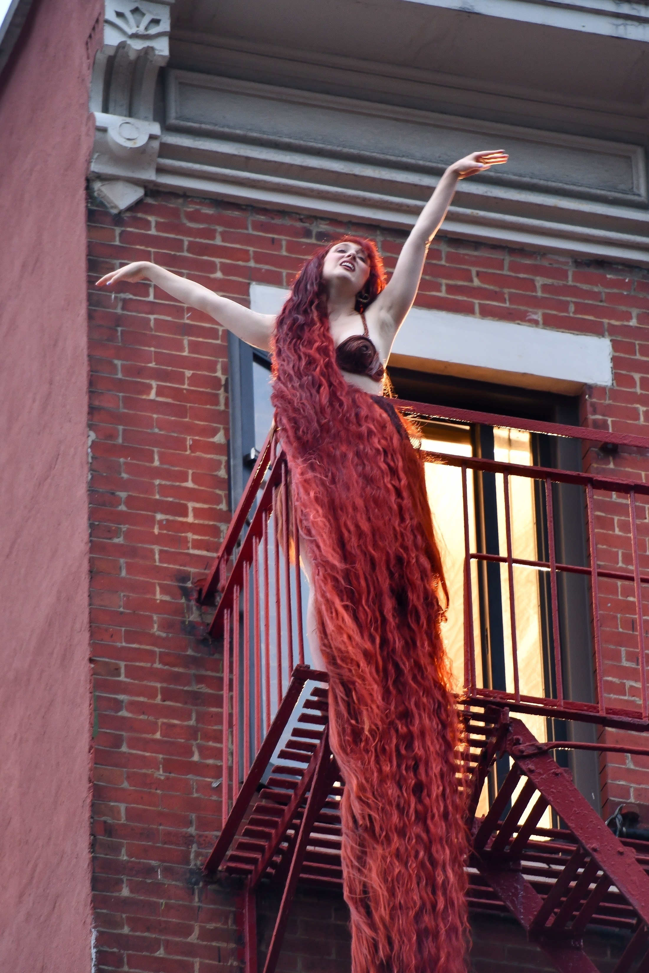 Chappell Roan channels her inner Rapunzel with 4 stories long hair, while filming a music video in NYC.