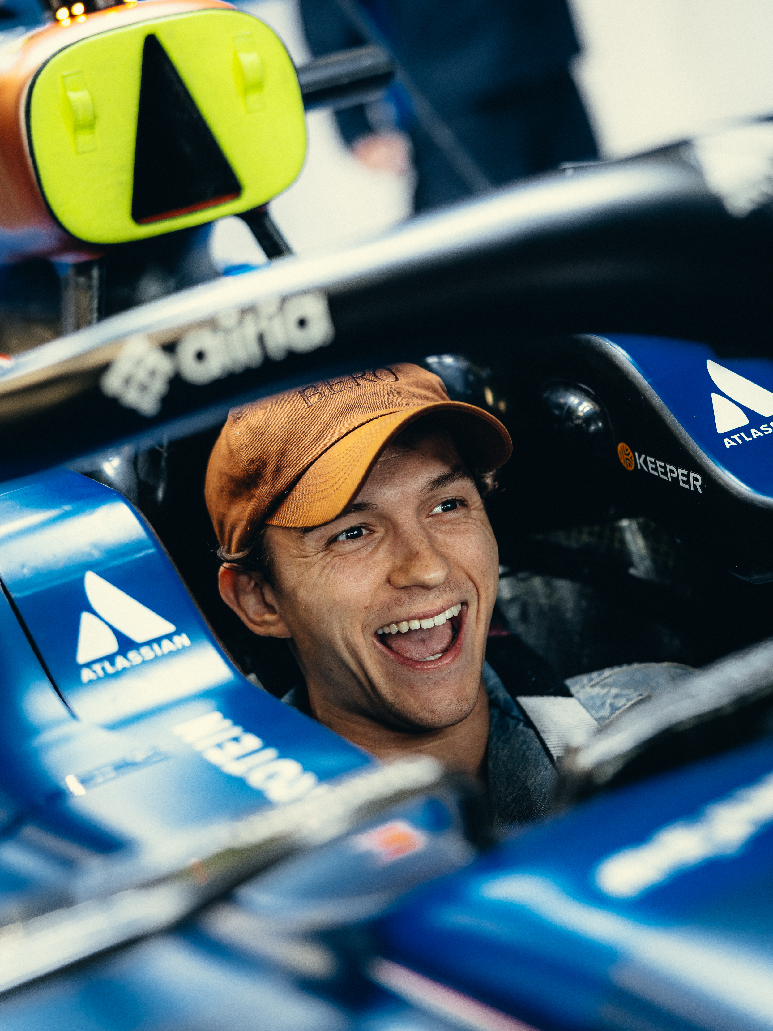 Tom Holland at Sunday’s British Grand Prix at Silverstone, where he had the time of his life stepping into Alex Albon’s Atlassian Williams Racing Formula 1 car just ahead of the race, which was won by Lando Norris.