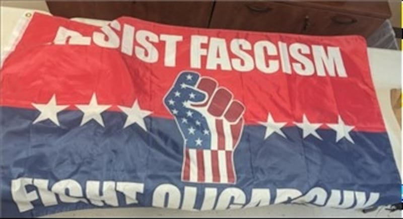 Officers found a flag belonging to one of the suspects.