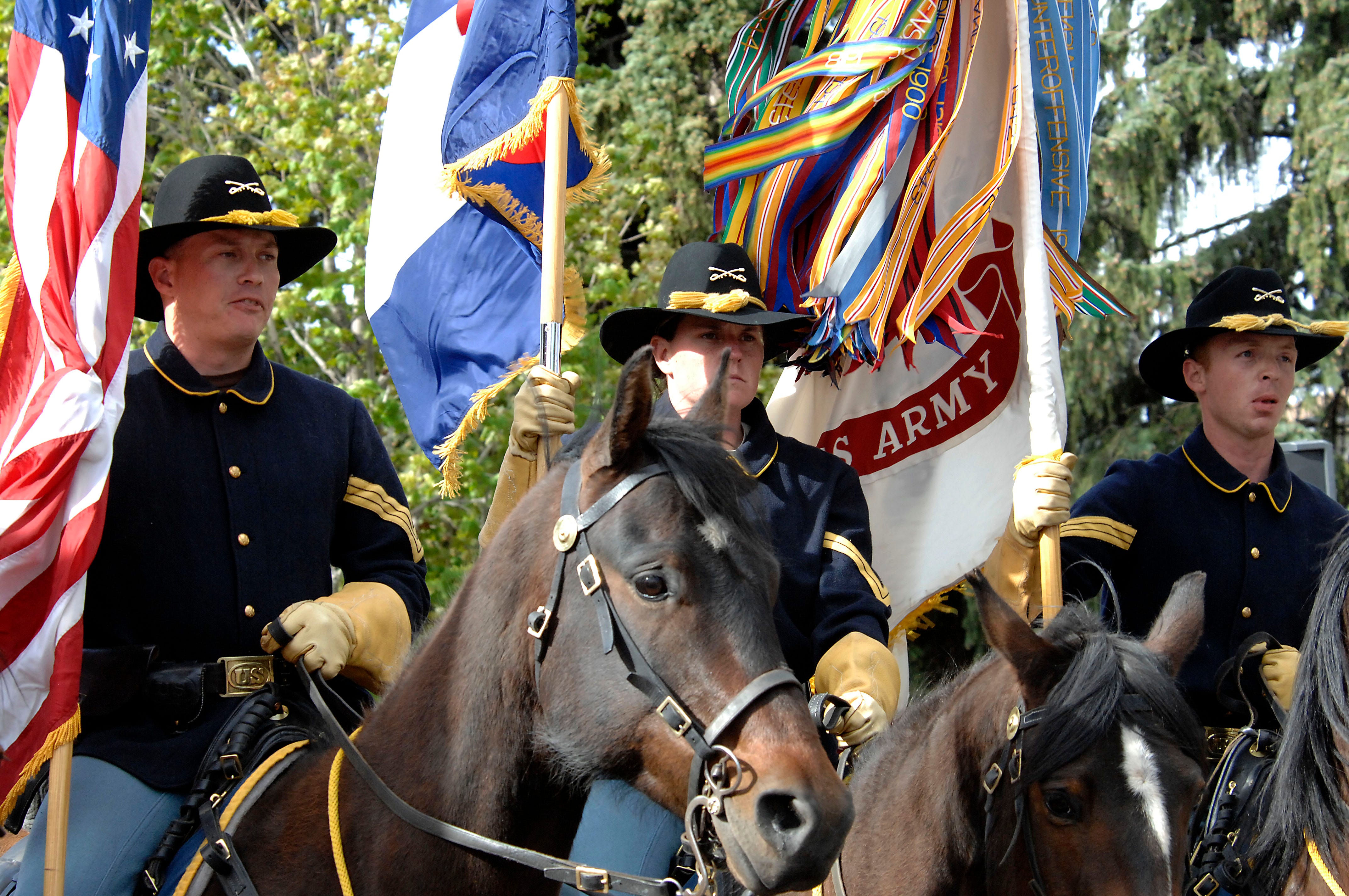 Members of the the US Army's 4th Infantry Division Mounted Color Guard from Fort Carson, Colorado perform during a ceremony in Colorado Springs on May 16th, 2011.