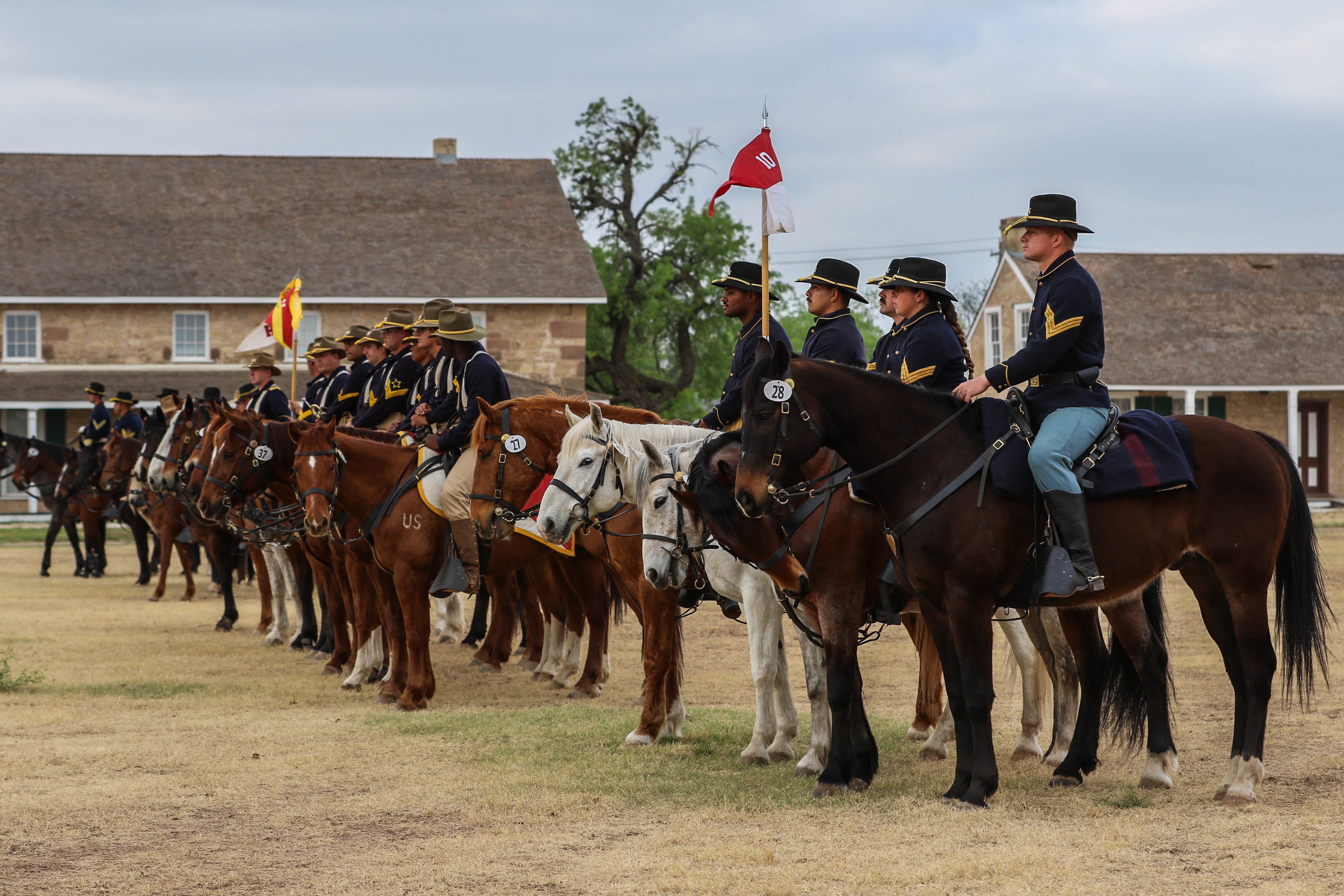 Cavalry unit riders from Colorado, California, Arizona and Texas prepare for the Army's Regional Cavalry Competition, April 21, 2022, in San Angelo, Texas.
