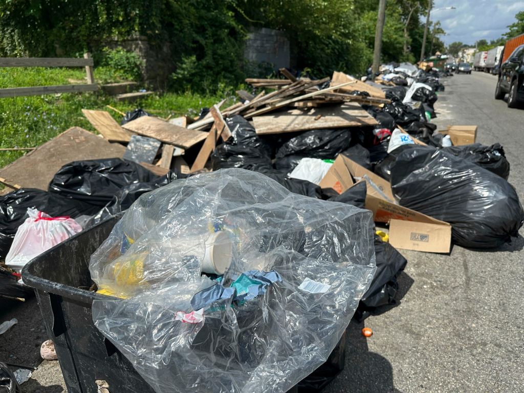 Trash piles up on a Philadelphia street during a city workers' strike.