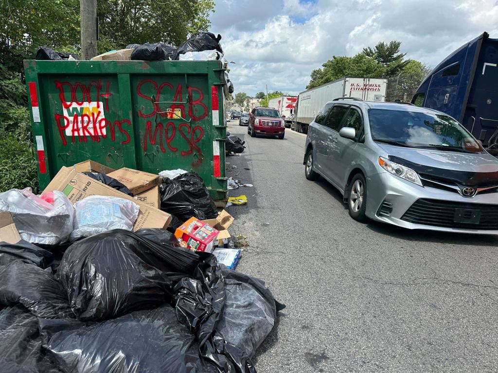 Trash piles up on a Philadelphia street during a city worker strike.