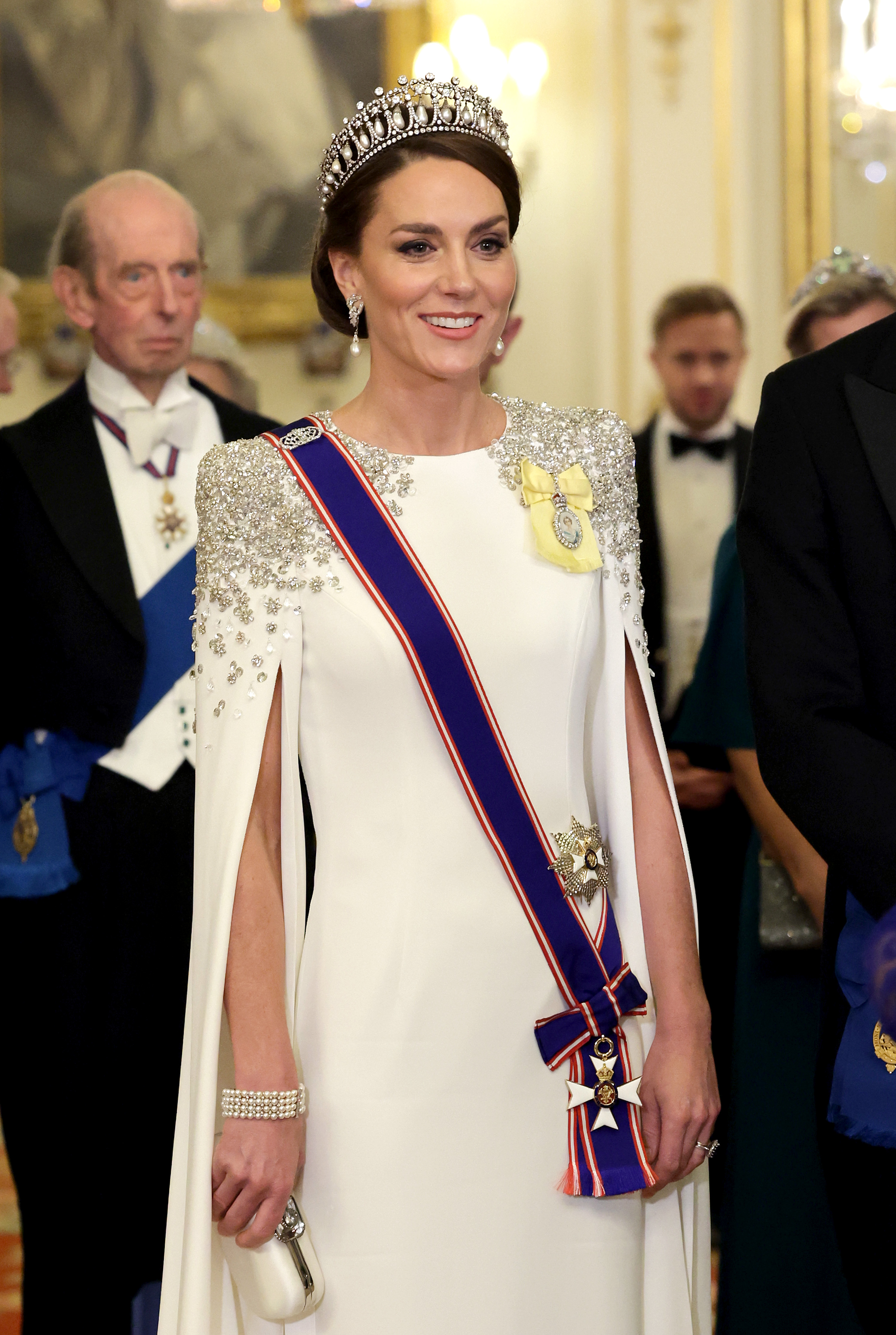 Kate Middleton in a white gown in the Lover's Knot Tiara. 