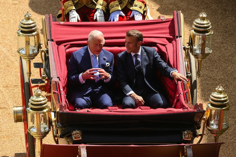 King Charles III and France's President Emmanuel Macron travel in the 1902 State Landau carriage