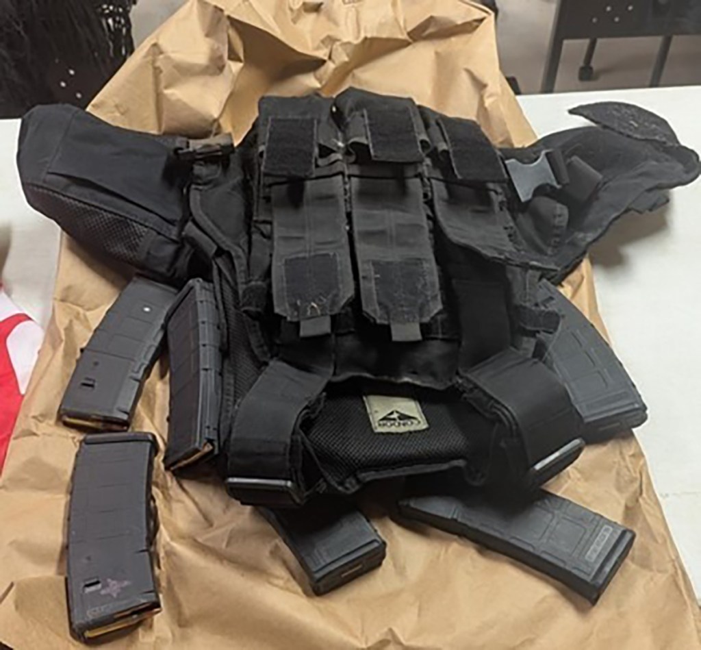 Body armor and assault rifle magazines allegedly in possession of the suspects.