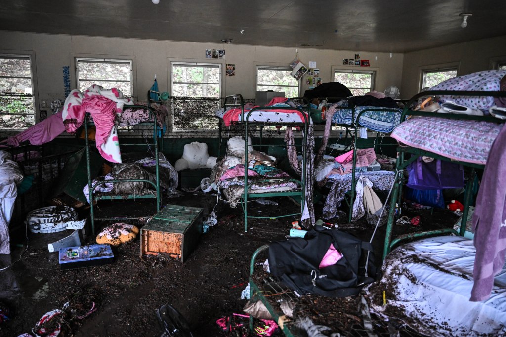 The flooded interior of a cabin at Camp Mystic where at least 20 girls went missing on during the flooding.