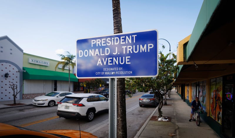 The sign "President Donald J. Trump Avenue" sits on Palm Ave during the day on Monday, Nov. 25, 2024, after its designation in Hialeah. (Alie Skowronski/Miami Herald/Tribune News Service via Getty Images)