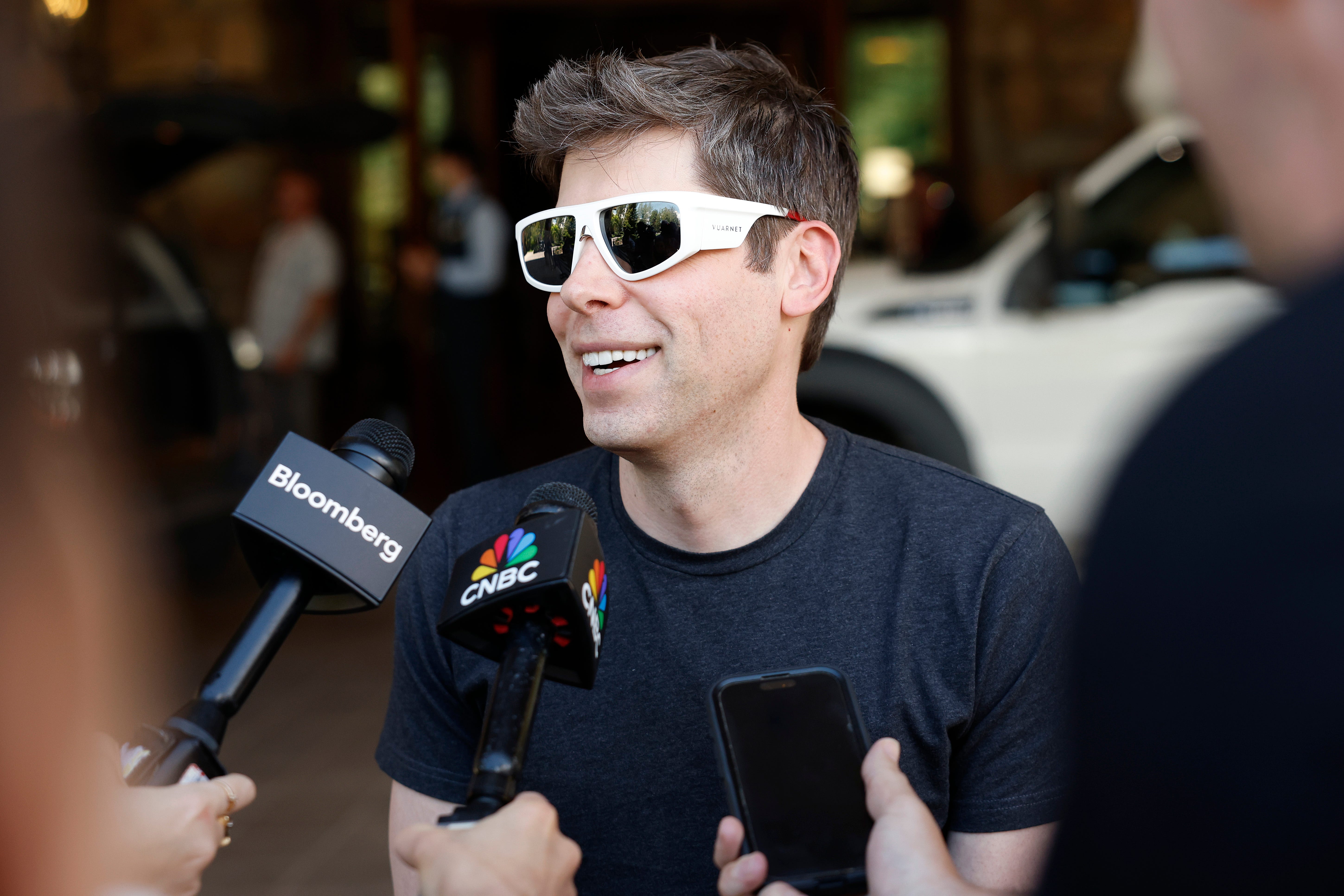 SUN VALLEY, IDAHO - JULY 08: CEO of OpenAI Sam Altman speaks to members of the media as he arrives at the Sun Valley lodge for the Allen & Company Sun Valley Conference on July 8, 2025 in Sun Valley, Idaho.