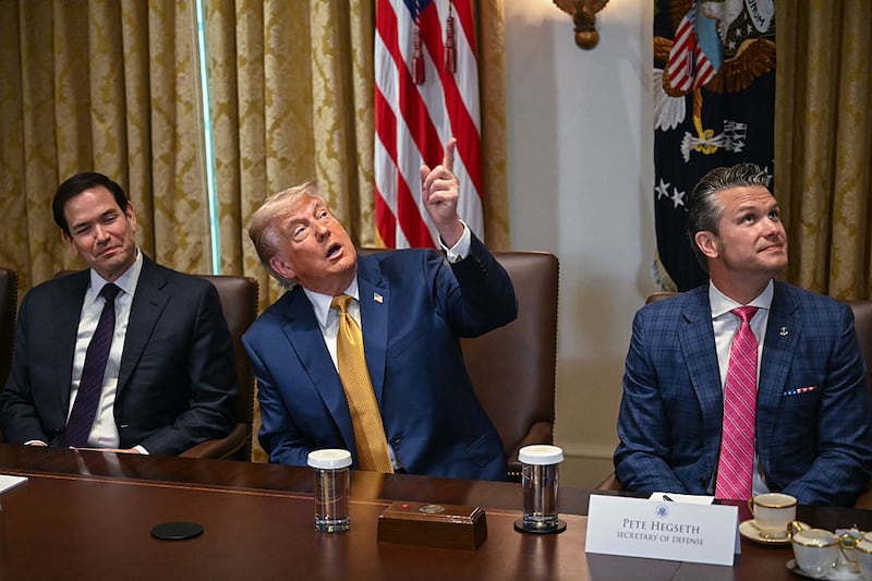 President Donald Trump (C) makes comments about new decor in the room as Secretary of Defense Pete Hegseth (R) and Secretary of State Marco Rubio (L) look on during a cabinet meeting in the Cabinet Room of the White House in Washington, DC, on July 8, 2025. (Photo by ANDREW CABALLERO-REYNOLDS / AFP) (Photo by ANDREW CABALLERO-REYNOLDS/AFP via Getty Images)
