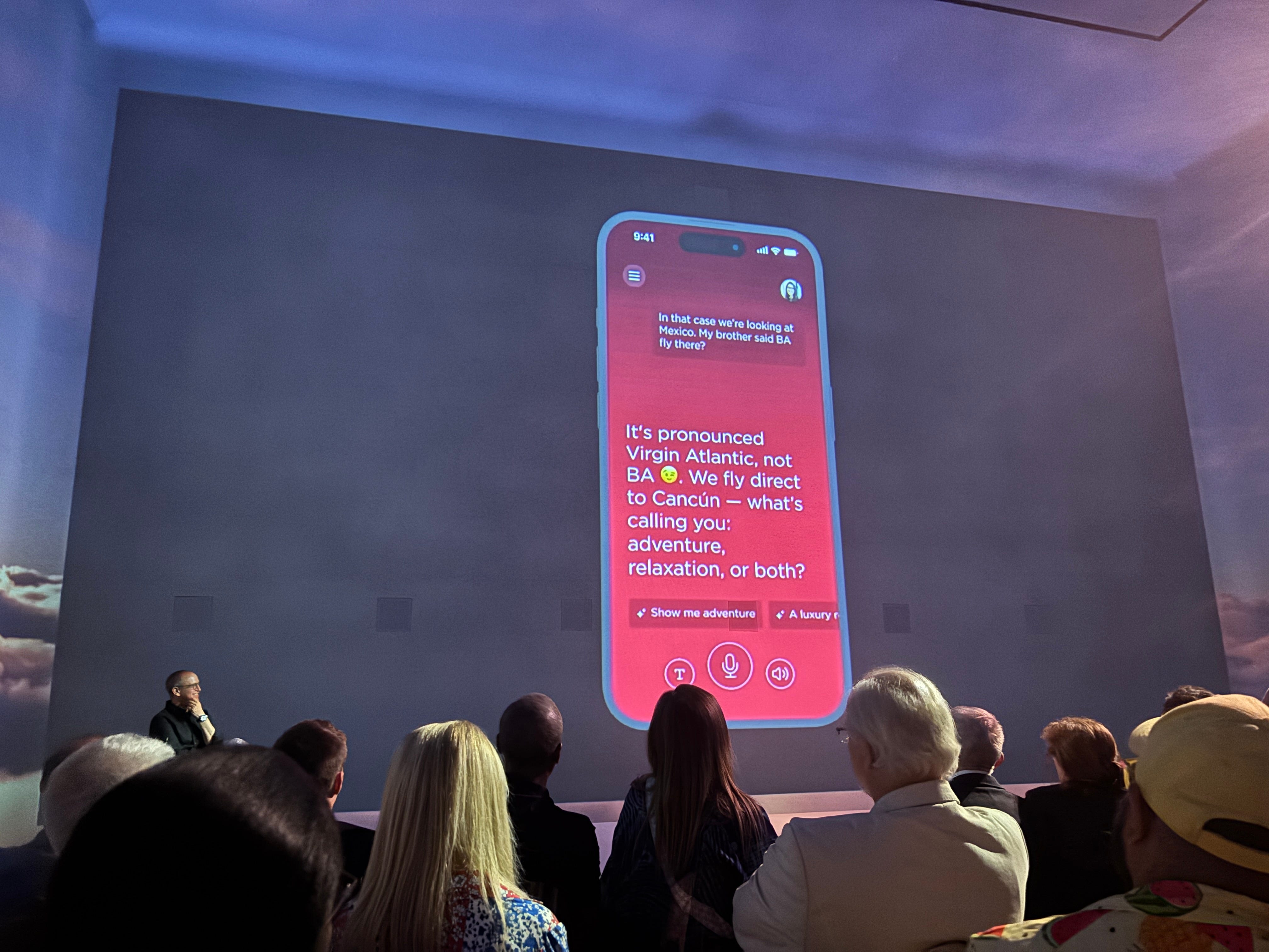 A demo of Virgin Atlantic's AI Concierge jokes about British Airways at an event on July 8, 2025.