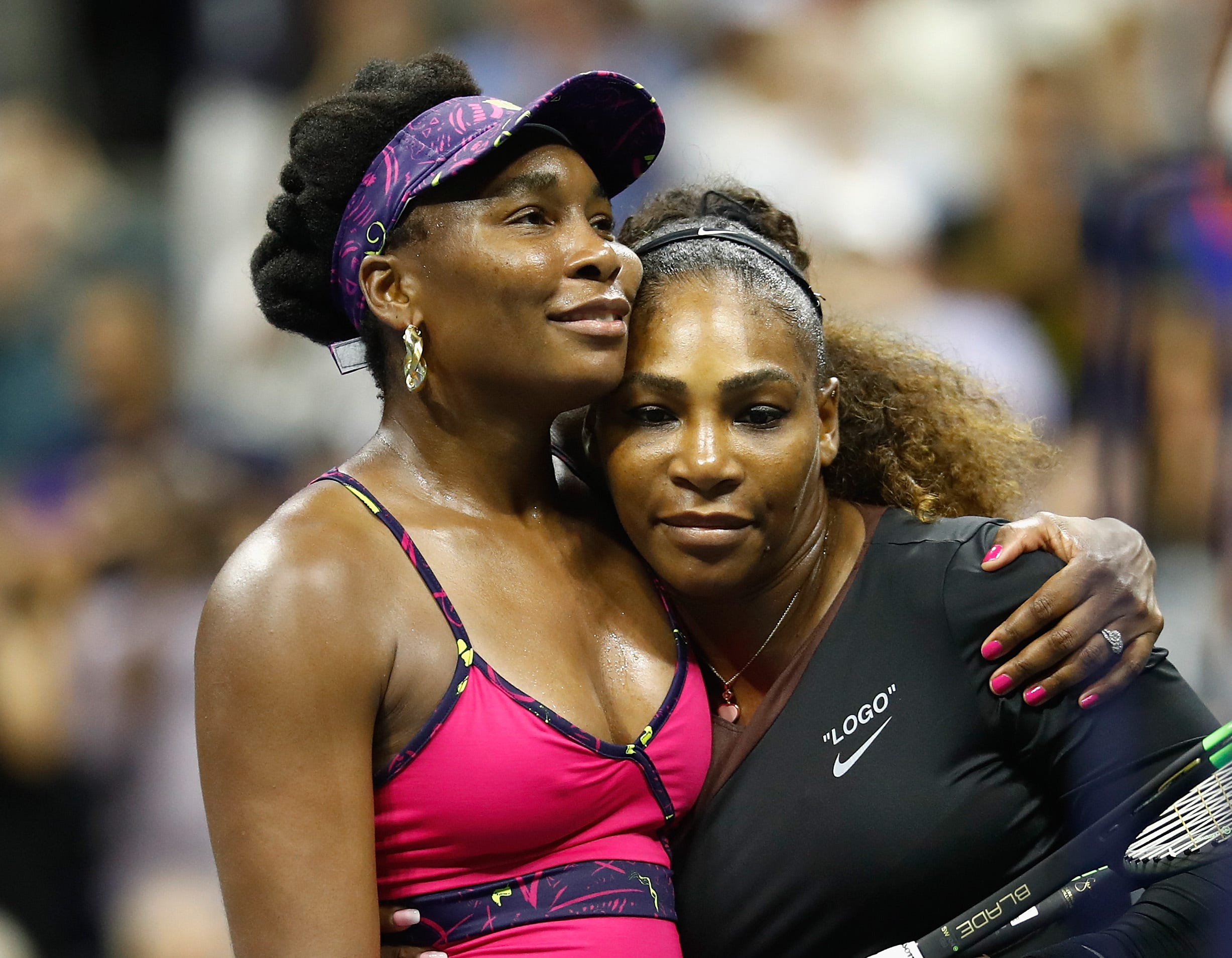 Serena Williams is congratulated by her sister and opponent Venus Williams following their ladies' singles third-round match on Day Five of the 2018 US Open.