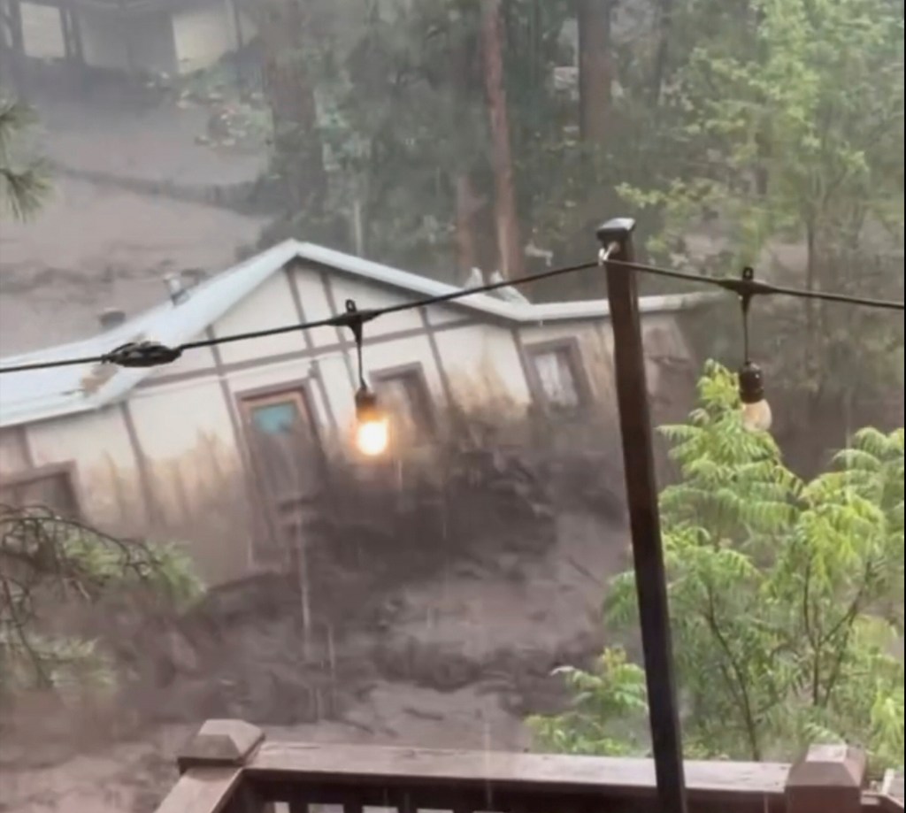 House being swept away by flash flood in Ruidoso, New Mexico.