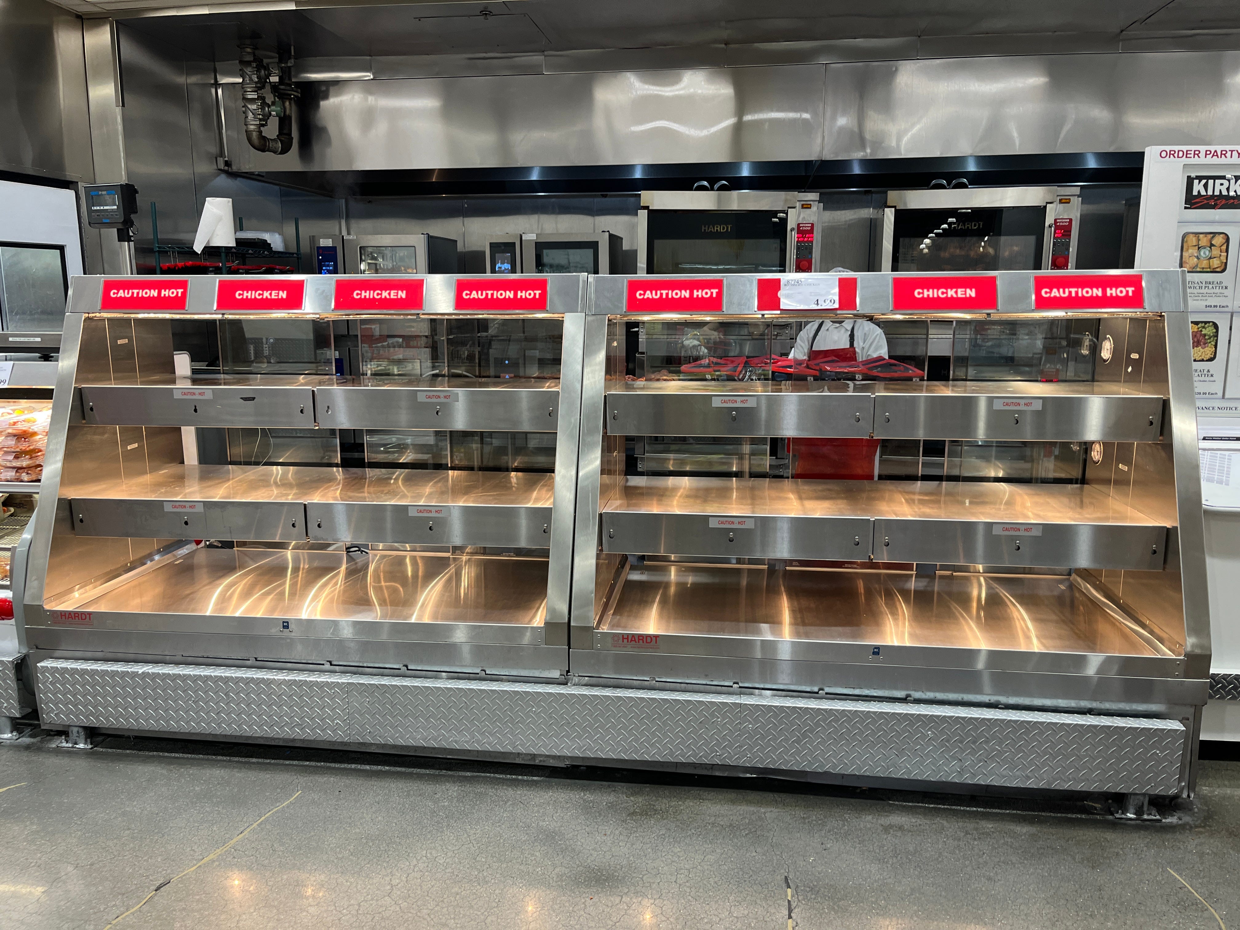 Empty rotisserie chicken shelves at Costco.