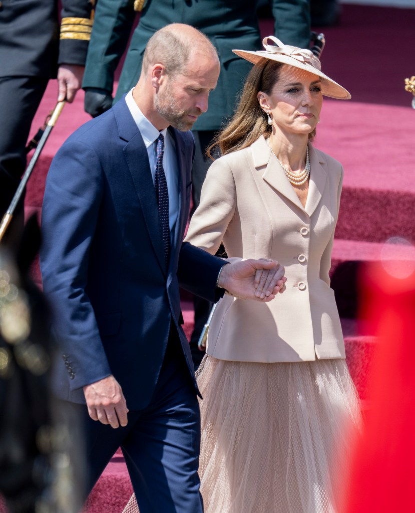 WINDSOR, ENGLAND - JULY 8: Prince William, Prince of Wales and Catherine, Princess of Wales during the formal welcome at the Royal Dais on July 8, 2025 in Windsor, England. President Emmanuel Macron and Mrs Brigitte Macron visit the UK in the first visit State Visit made by France in 17 years. They are staying at Windsor Castle, hosted by King Charles III and Queen Camilla, and a banquet will be held there in their honour. The Macrons will visit Imperial College, and the President will address Parliament during his stay. (Photo by Mark Cuthbert/UK Press via Getty Images)