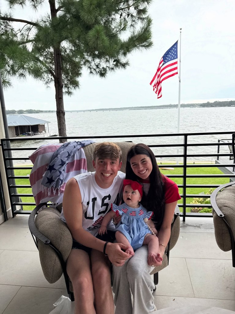 Grant Troutt, Madi Prewett with their daughter, Hosanna, celebrating the Fourth of July.