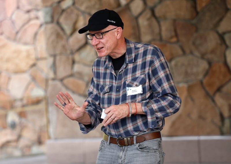 News Corp CEO Robert Thomson wore a plaid button-down complete with friendship bracelets.