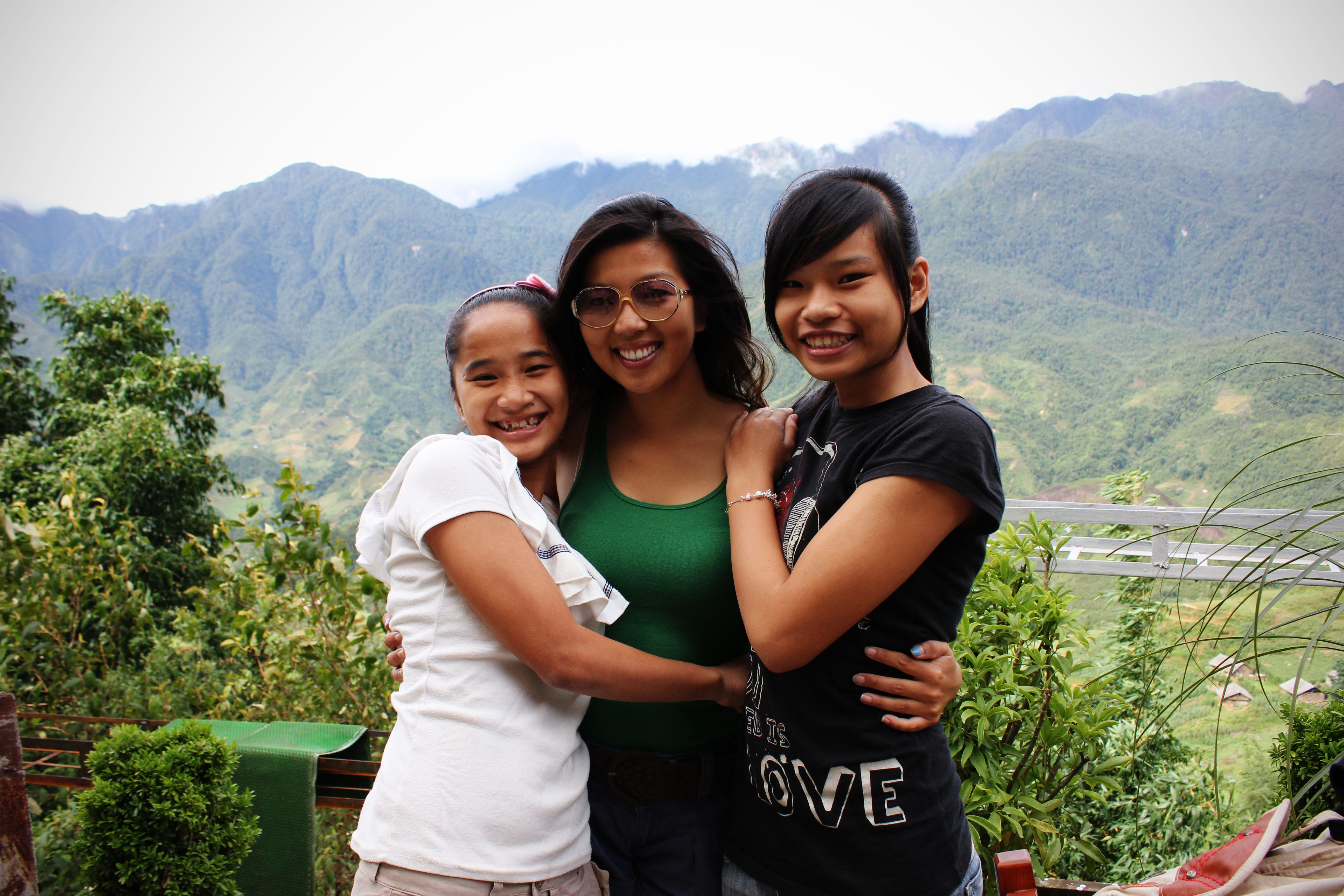 Ai Vuong with two young girls when she was traveling back to Central Vietnam in her 20s.