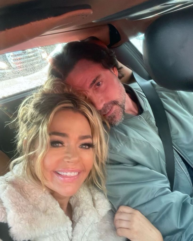 Denise Richards poses for a picture with Aaron Phypers.