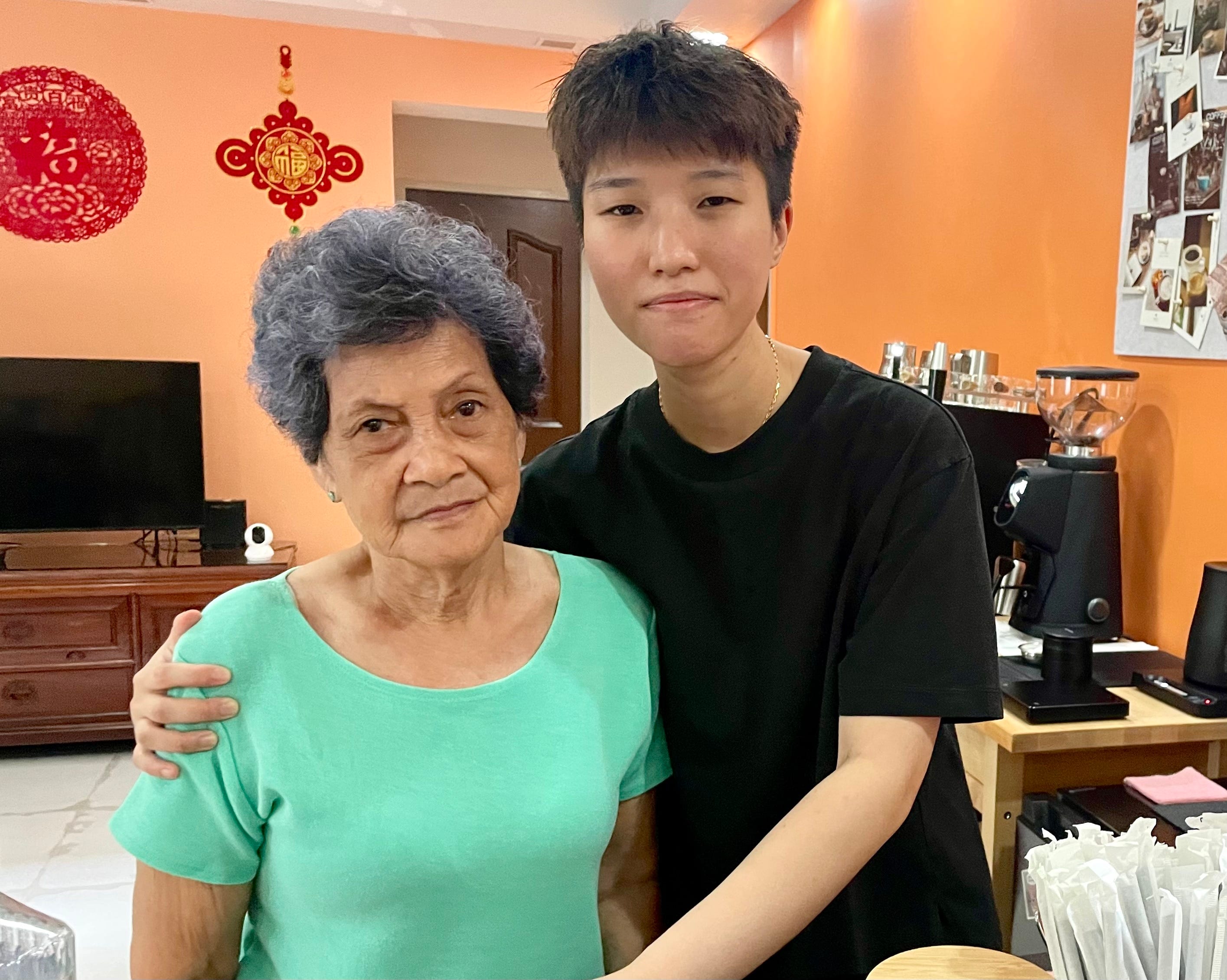 Chia's grandmother, who has dementia, helps her out in the café with simple tasks.