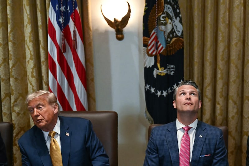 Secretary of Defense Pete Hegseth looks toward the ceiling after President Donald Trump made remarks about new decor in the room, during a cabinet meeting in the Cabinet Room of the White House in Washington, DC, on July 8, 2025.