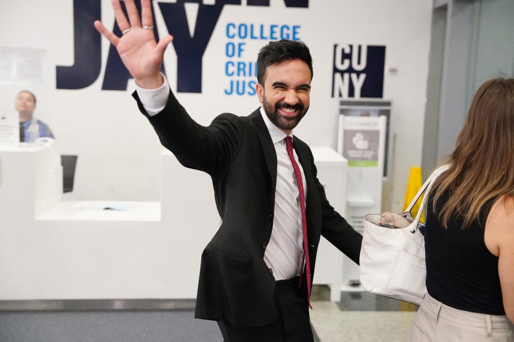 Zohran Mamdani waving goodbye.
