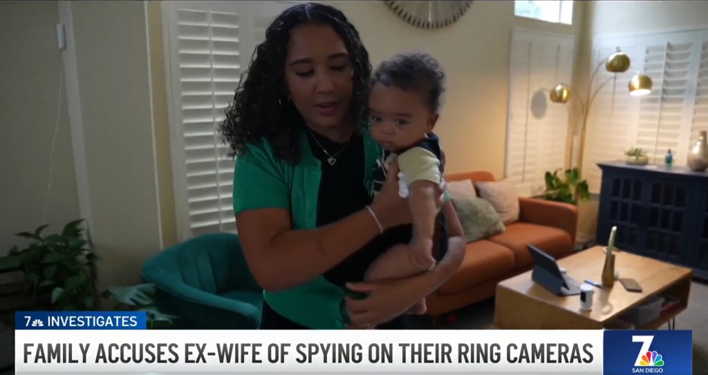Young and her newborn inside their home after allegedly being spied on.