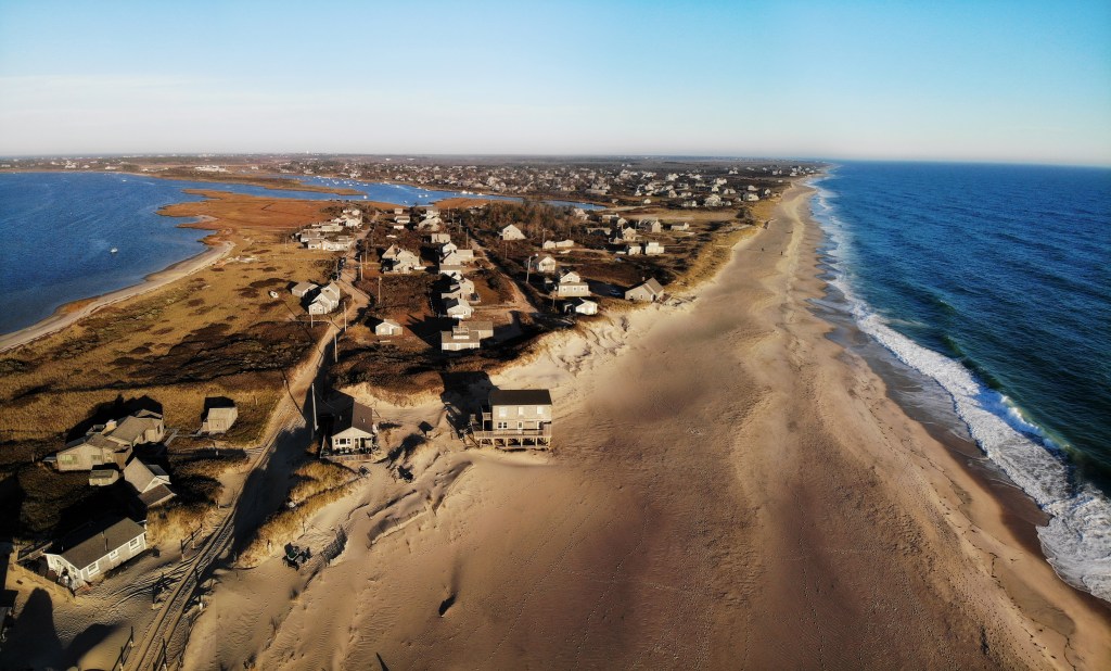 Aerial view of Madaket Beach, Nantucket at sunset.