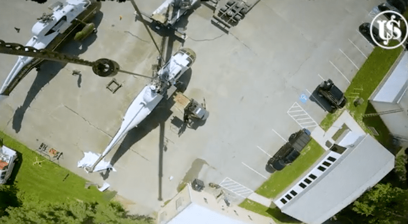 The rebuilt aircraft sits in a parking lot of the Secret Service headquarters.