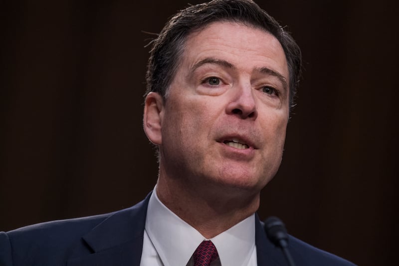 Former FBI Director James Comey testifies about President Trump's possible campaign ties to Russia before a Senate Select Intelligence Committee hearing on June 8, 2017.