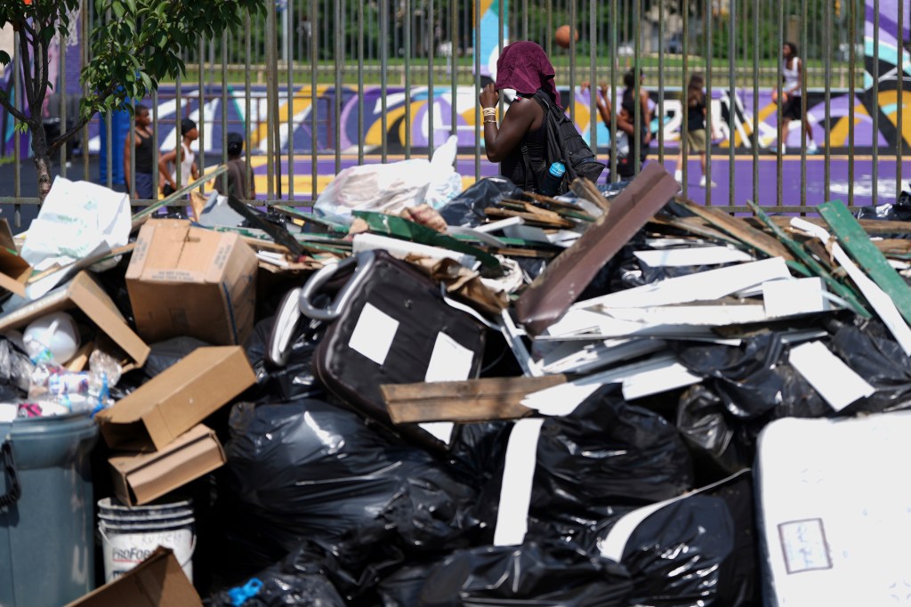 Piles of garbage pile up at a collection site in Philadelphia on July 9, 2025.