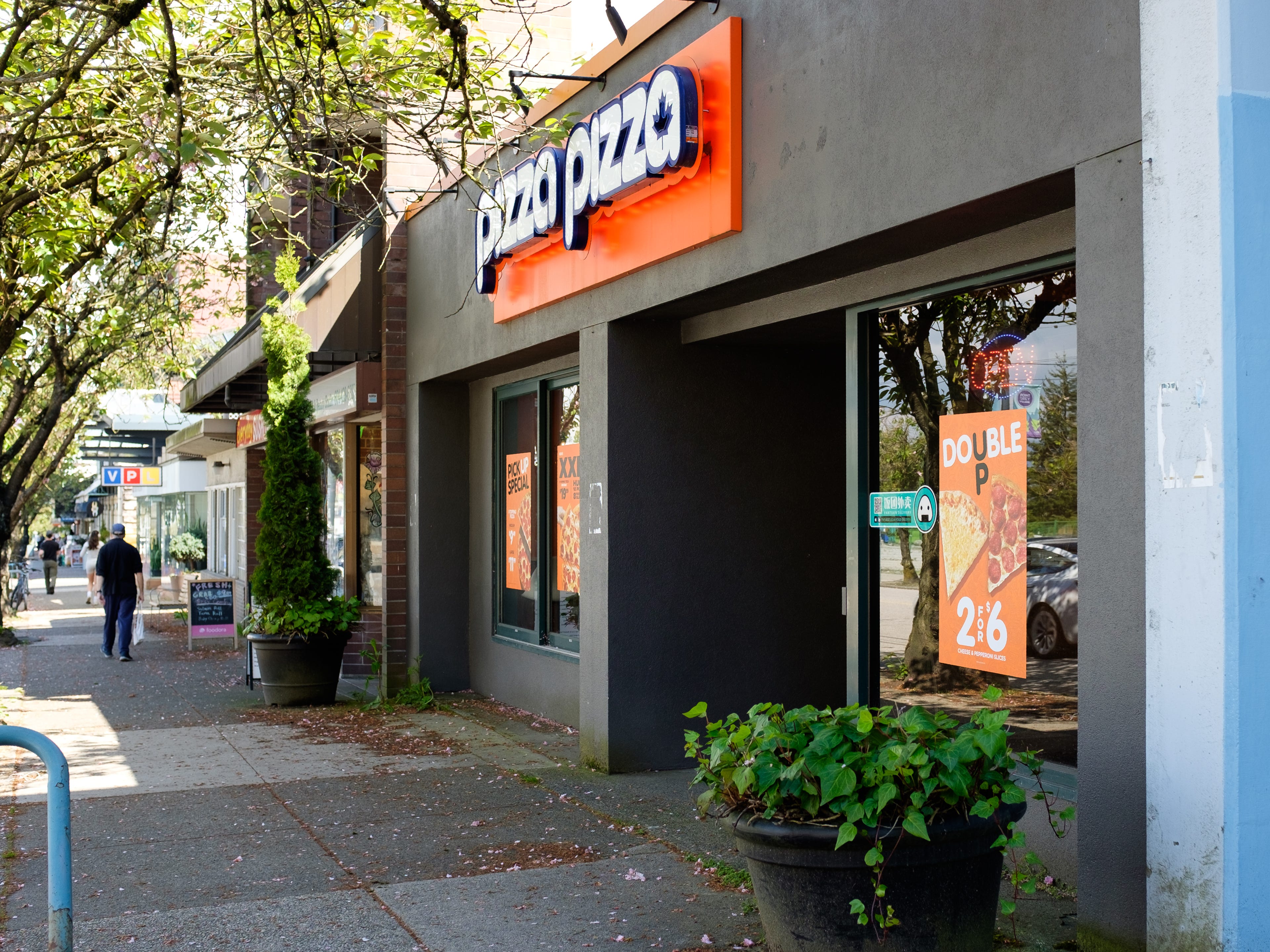 The exterior of a Pizza Pizza location in Vancouver, British Columbia.