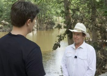 Trapped by floodwater, camp director called to say she ‘can’t get out’