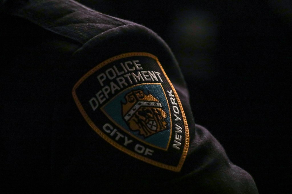 NYPD patch on a uniform.