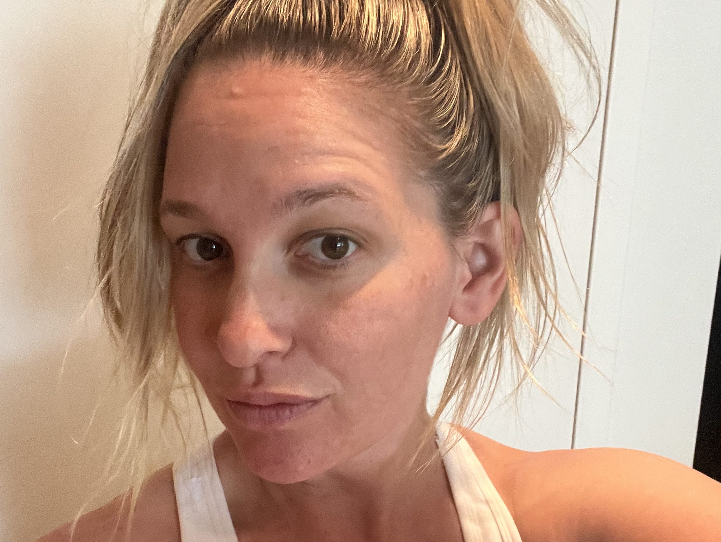 Author wearing workout gear after doing an at-home workout.