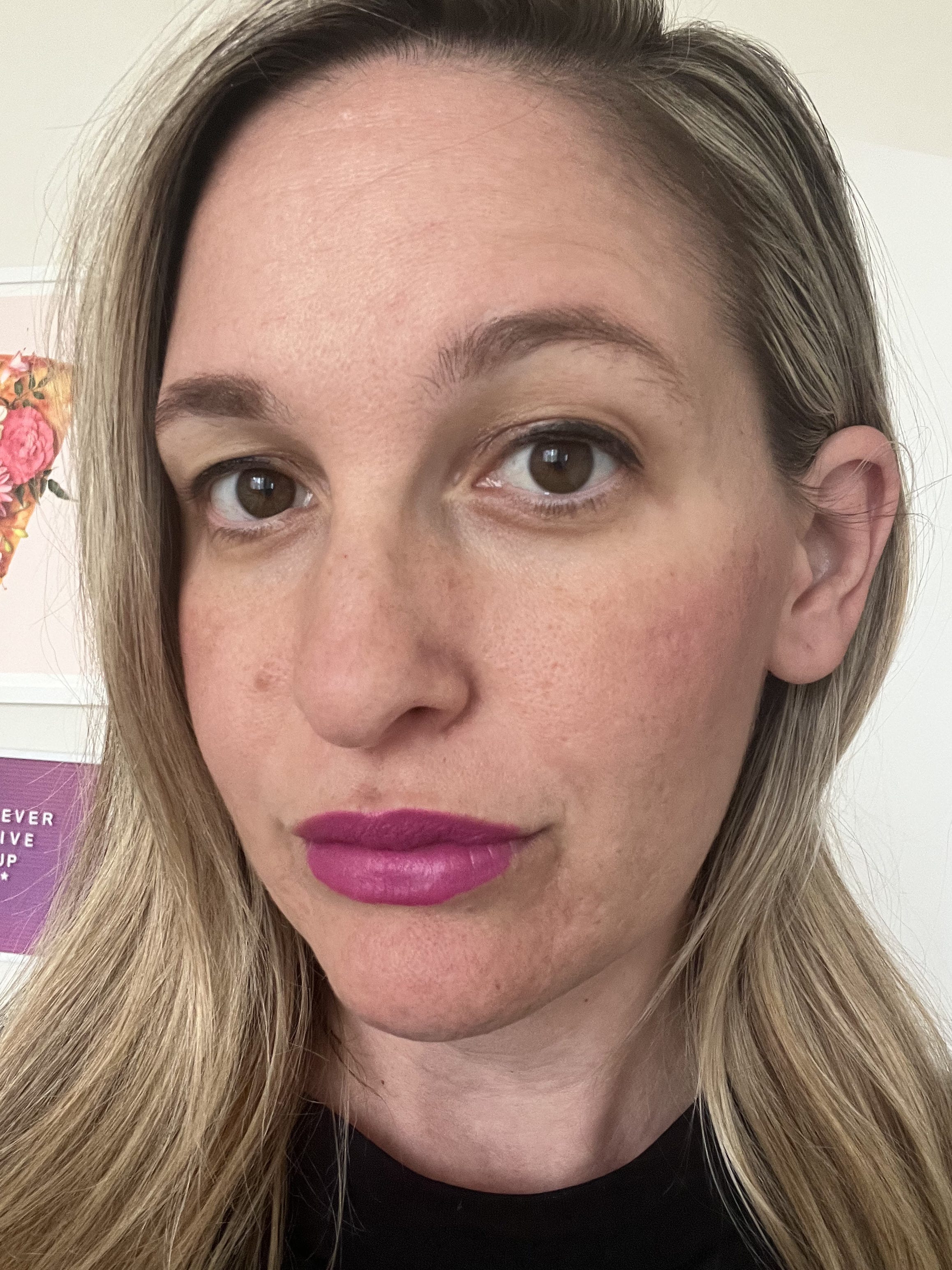Selfie of author at the end of the day wearing sunscreen and makeup.