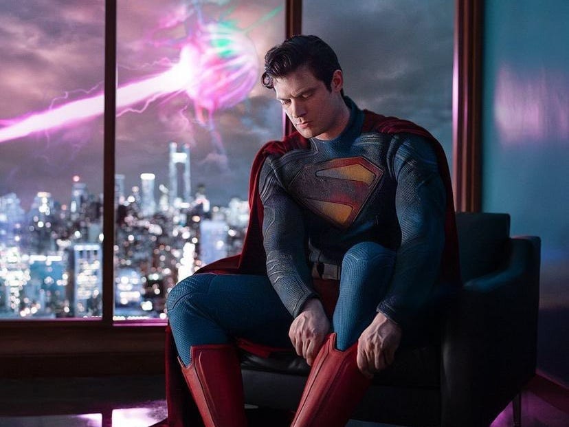 Superman putting on his boots