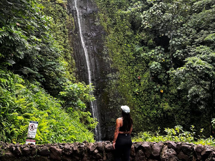 The writer on a waterfall hike in Oahu, Hawaii.
