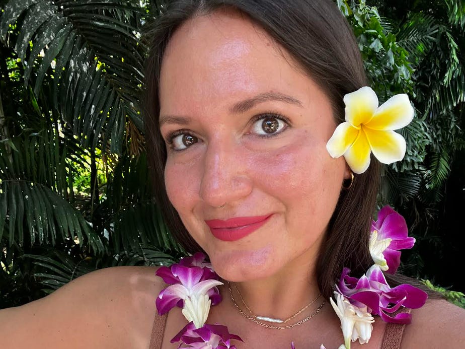 The writer with a flower lei she made in Hawaii.