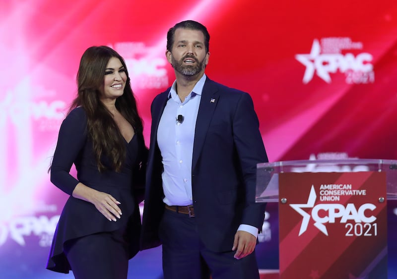 Don Trump Jr. and Kimberly Guilfoyle stand on stage as they address the Conservative Political Action Conference being held in the Hyatt Regency on February 26, 2021 in Orlando, Florida.