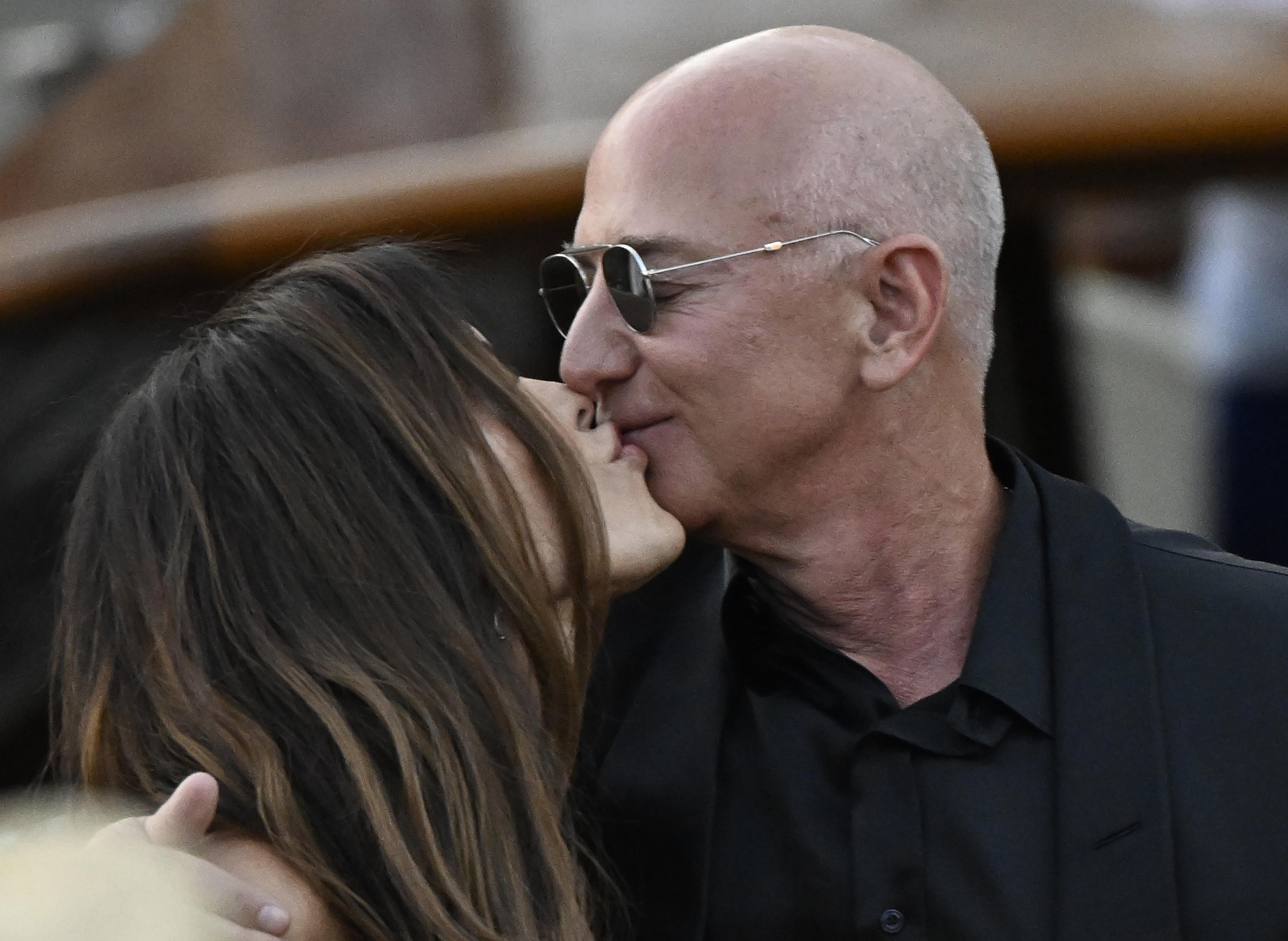 Lauren Sánchez and Jeff Bezos kiss on a water taxi in Venice, Italy. 