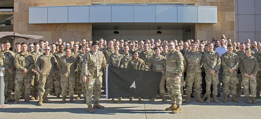 Space Flag 25-1 participants pose for a photo at Schriever Space Force Base, Colo., Dec. 2, 2024.