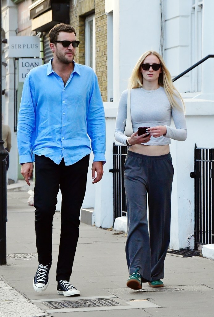Sophie Turner packs on the PDA with the British aristocrat and boyfriend Peregrine Pearson as they walked in London.