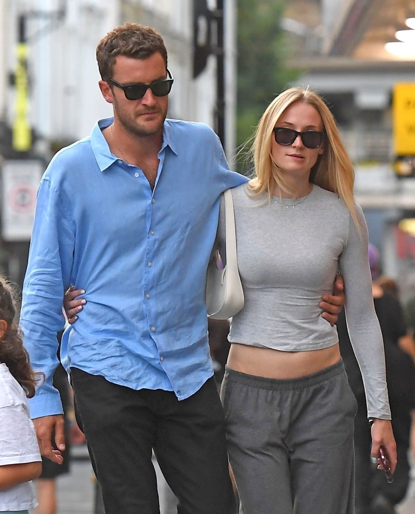 Sophie Turner packs on the PDA with the British aristocrat and boyfriend Peregrine Pearson as they walked in London.