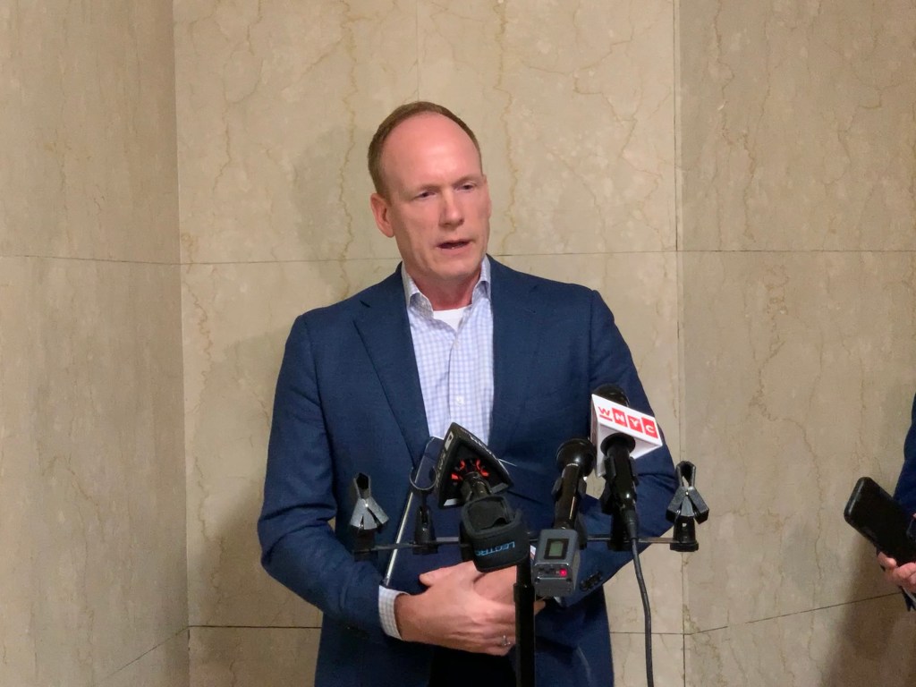 Budget Director Blake Washington at a press conference.