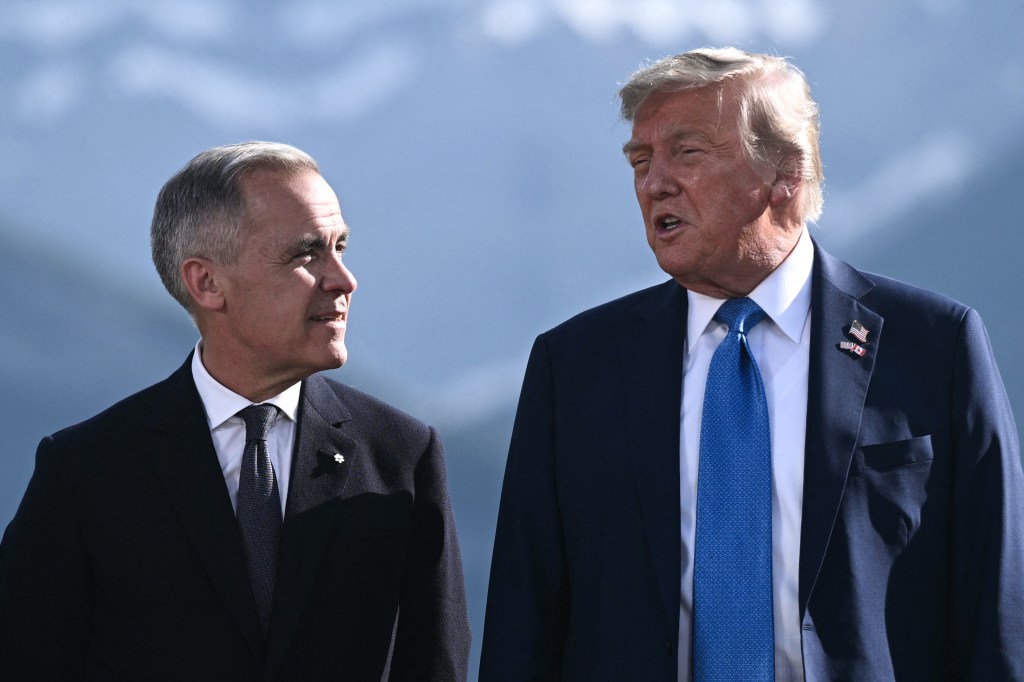 Mark Carney and Donald Trump at the G7 Summit.