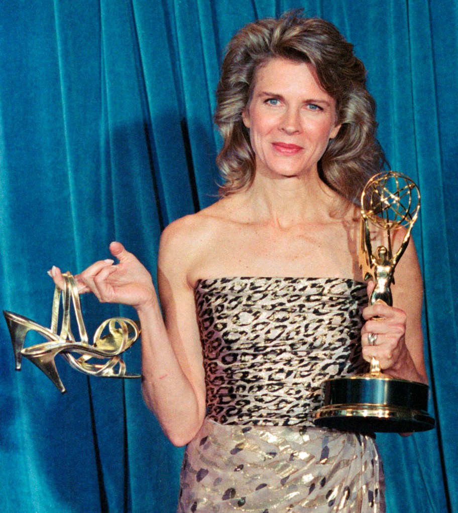 Candice Bergen posing with her Emmy award in 1989.